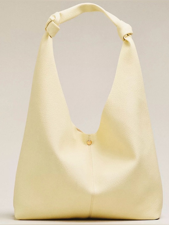 Anthropologie Handbags - Anthropologie Love Knot Slouchy Bag in Butter Yellow